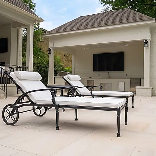 Poolside seating beside the covered outdoor kitchen