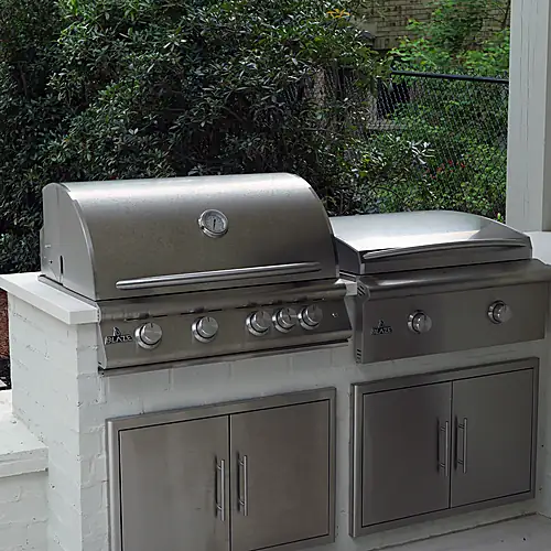 Built-in grill and storage in the outdoor kitchen