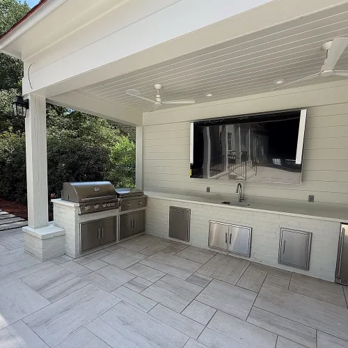 Covered brick kitchen with pale countertops