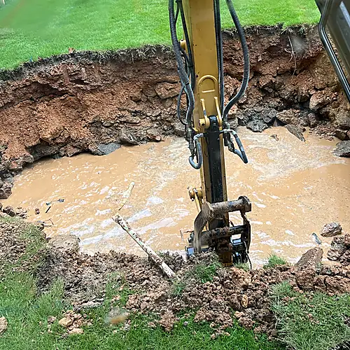 Excavation area opened up to correct a major drainage failure