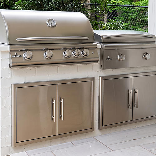 Built-in stainless steel grill and storage doors