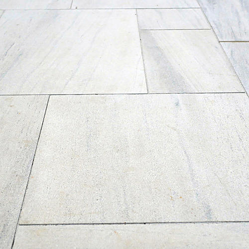 Limestone paving surface and fitted joints