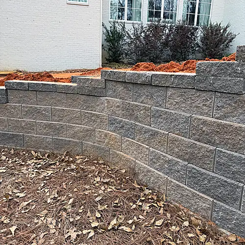 Retaining wall corner beside the raised yard