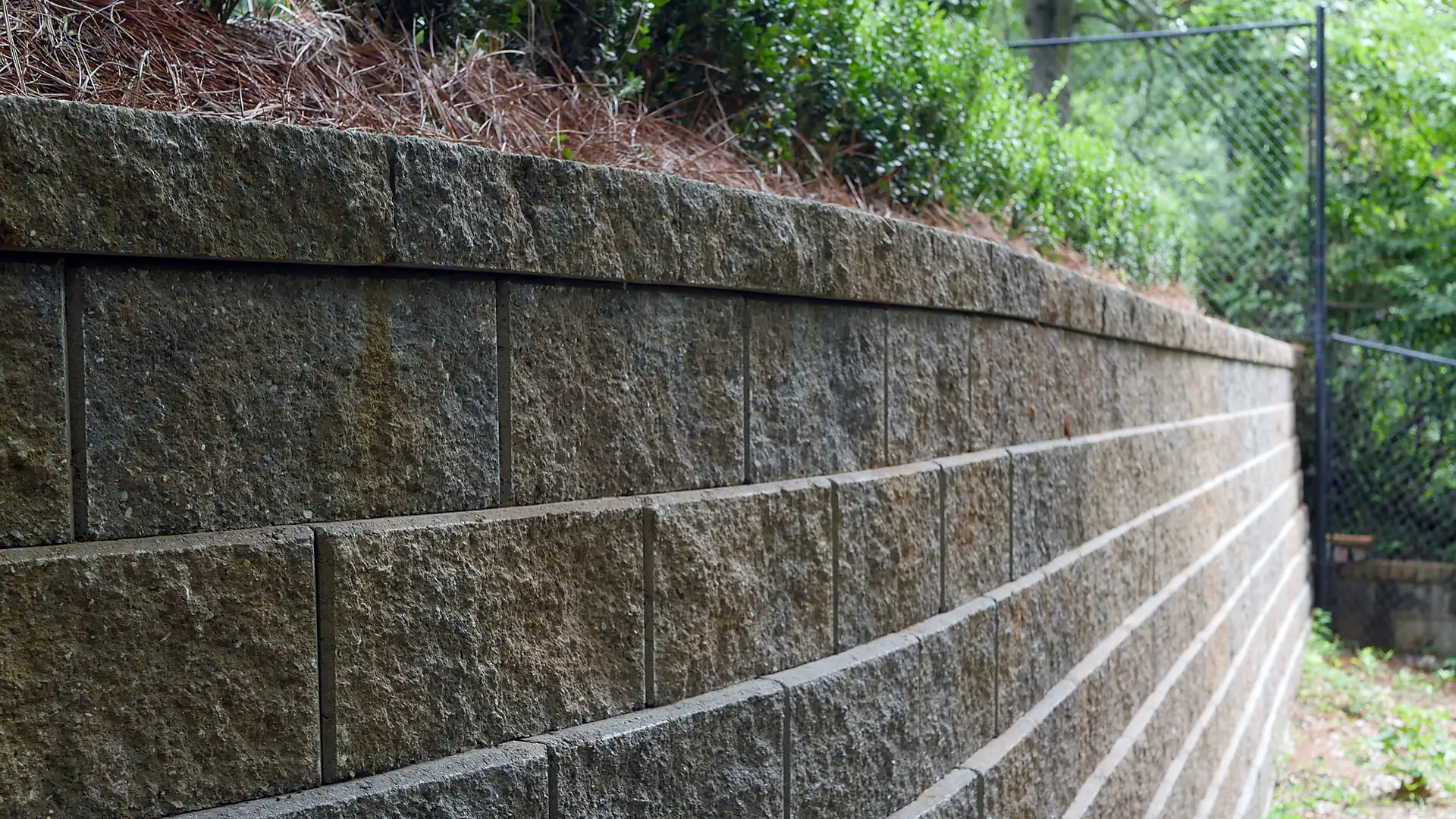 Retaining Wall Creates Usable Backyard Space in Northport, Alabama